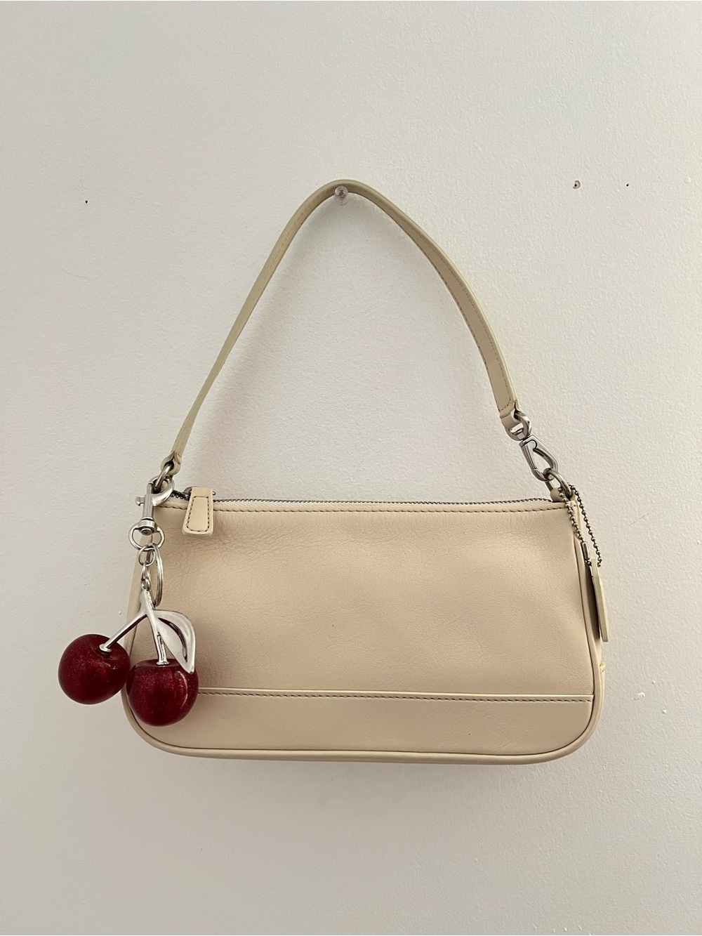 Cream Coach bag